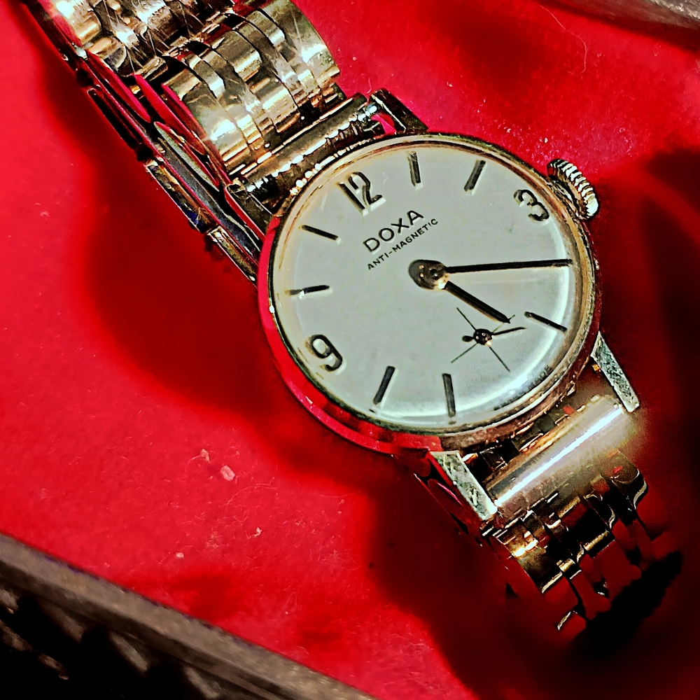 Doxa Silver Watch with White Dial